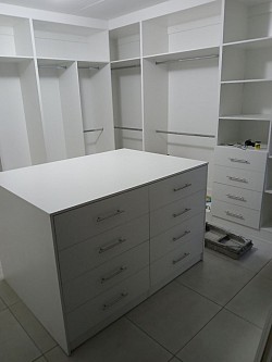 White melamine walk in closet